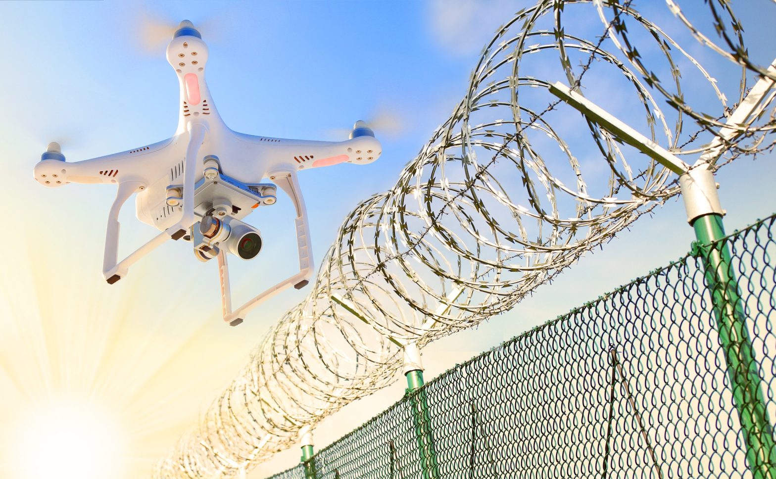Drone over a barbed wire fence. News - Washington State Prison - Hikal Abdulrahman