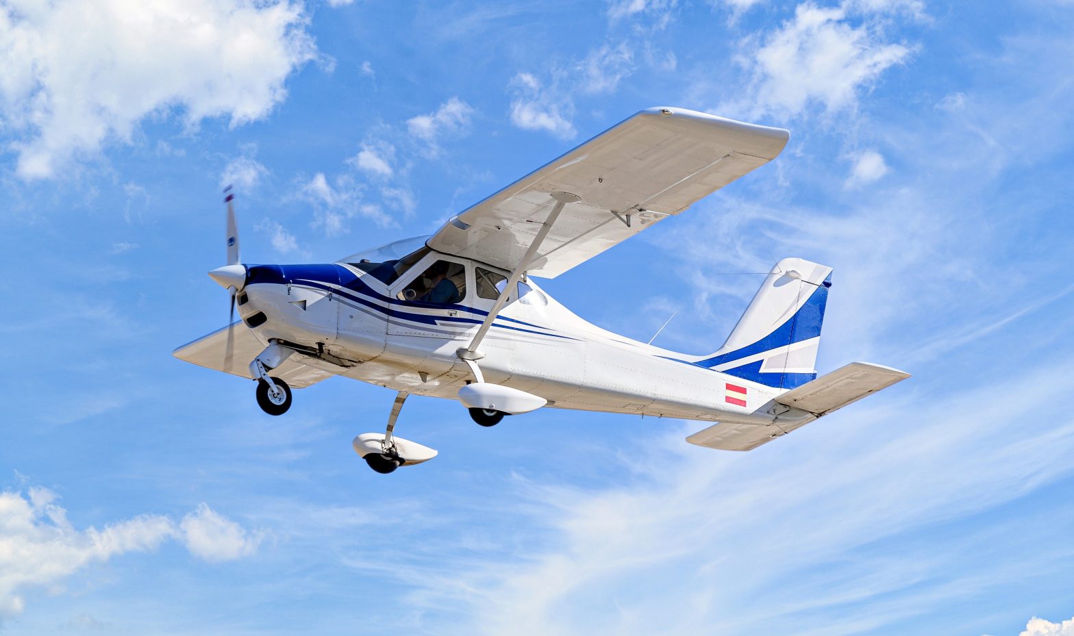 A small plane flying in the blue sky. News - Trevor Daniel Jacob sentencing