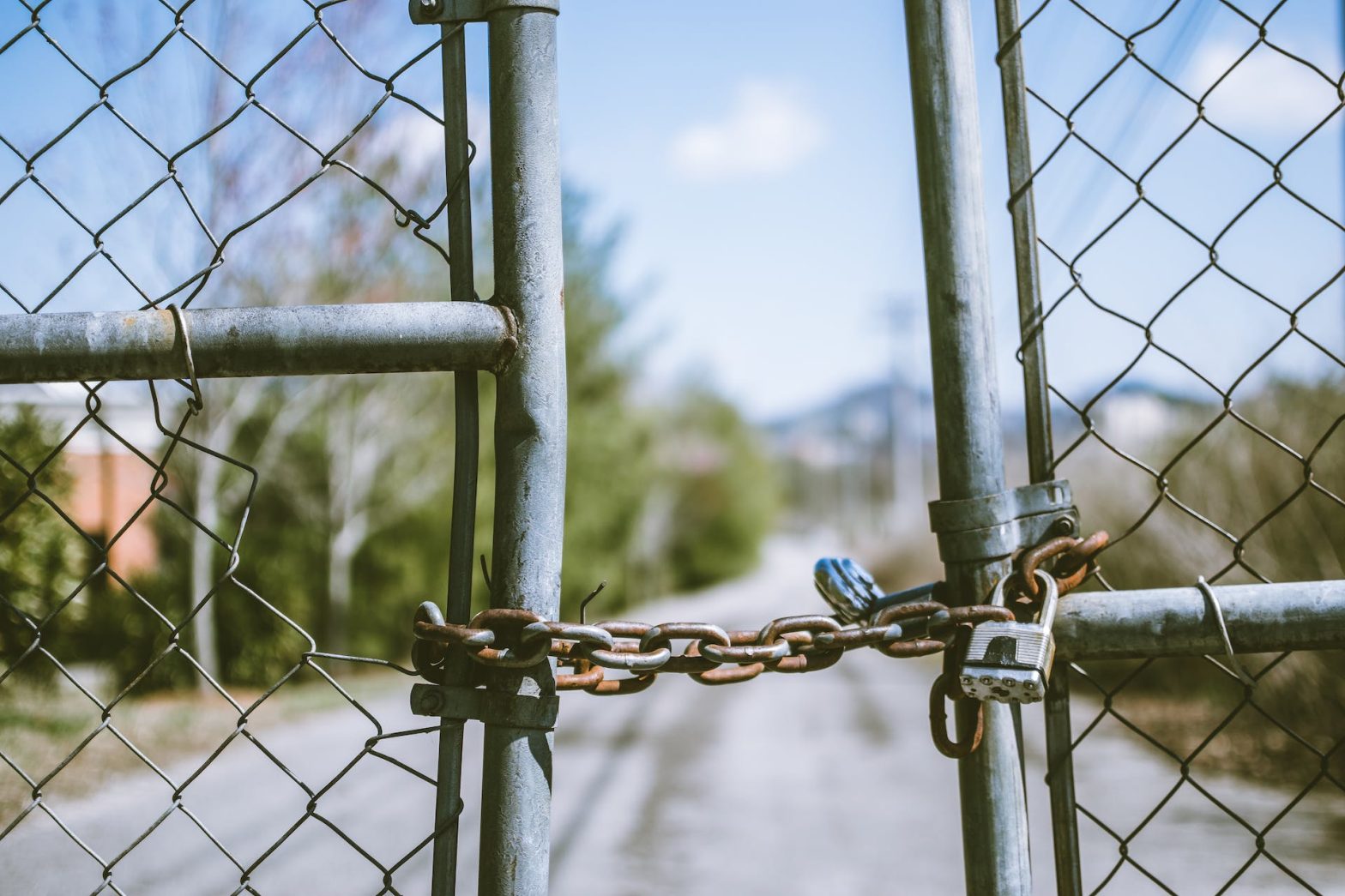 A chained, locked gate. News - Franklin County Juvenile Detention Center to Close by Year-End Due to Staff Shortage