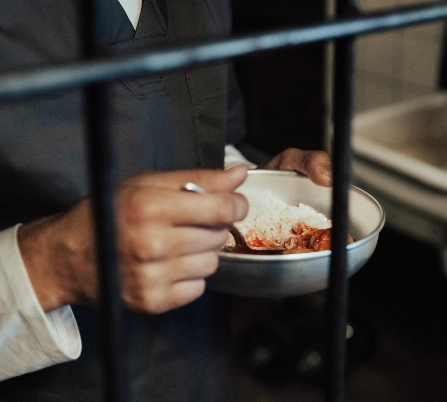 A inmate eating behind bars. News - New York State prisons respond to religious dietary needs with enactment of kosher and halal food bill