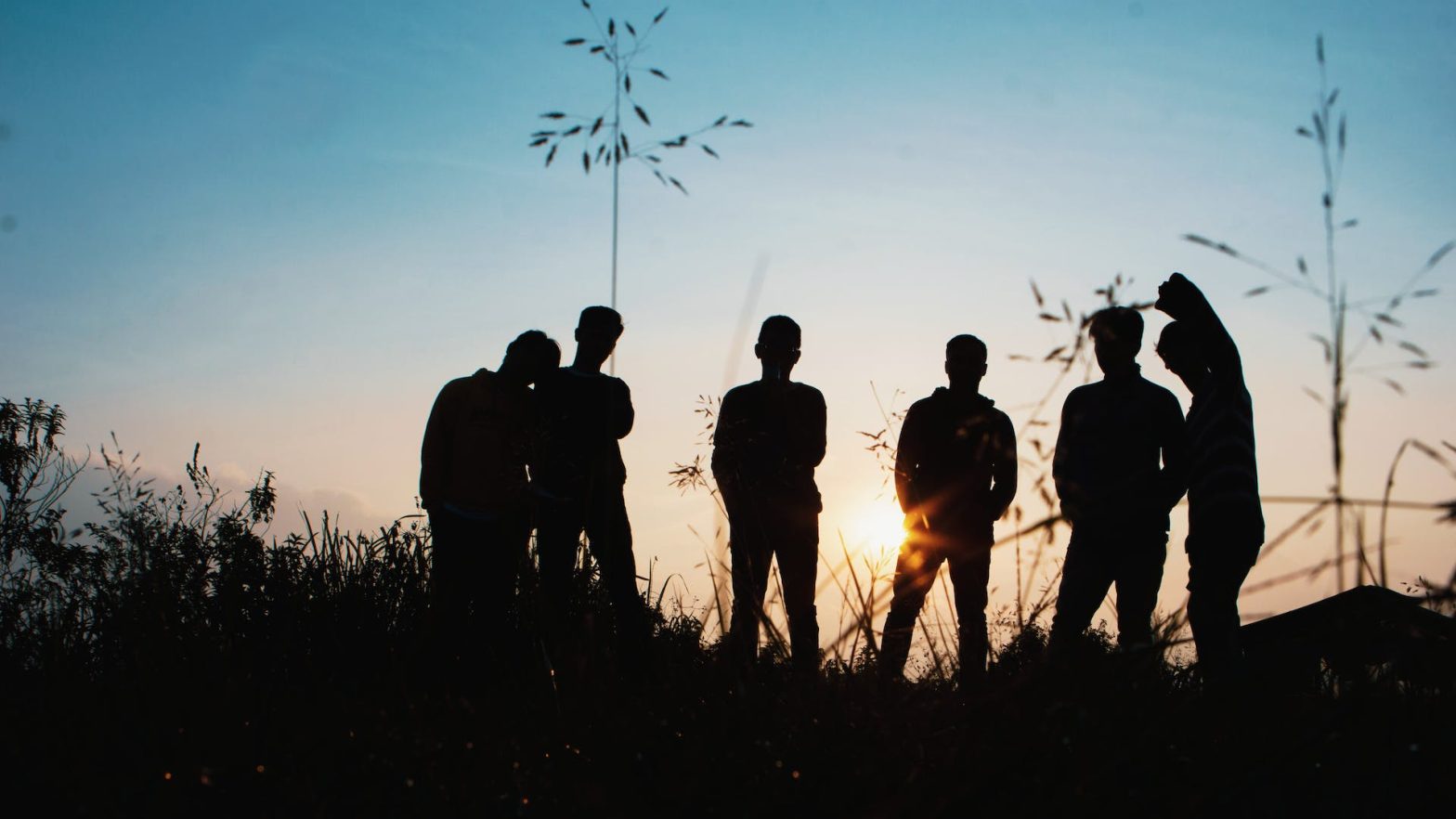 The silhouette of group of youth. News - Location for new youth detention center in Newbury Town approved despite pushback